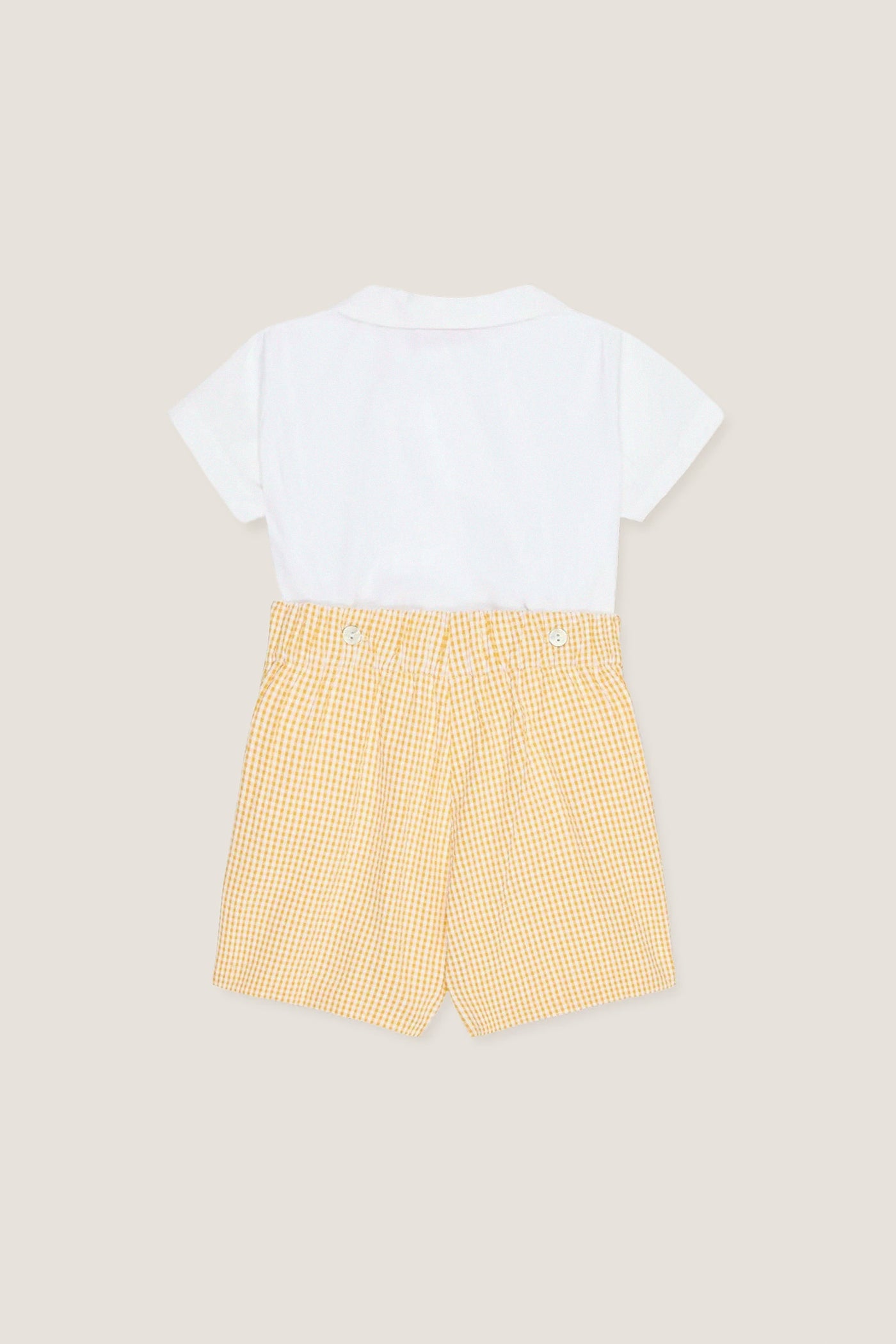Yellow Gingham Oliver Baby Boy Set features a classic white shirt with a Peter Pan collar and effortless gingham shorts, offering high-end, fun style and comfort.
