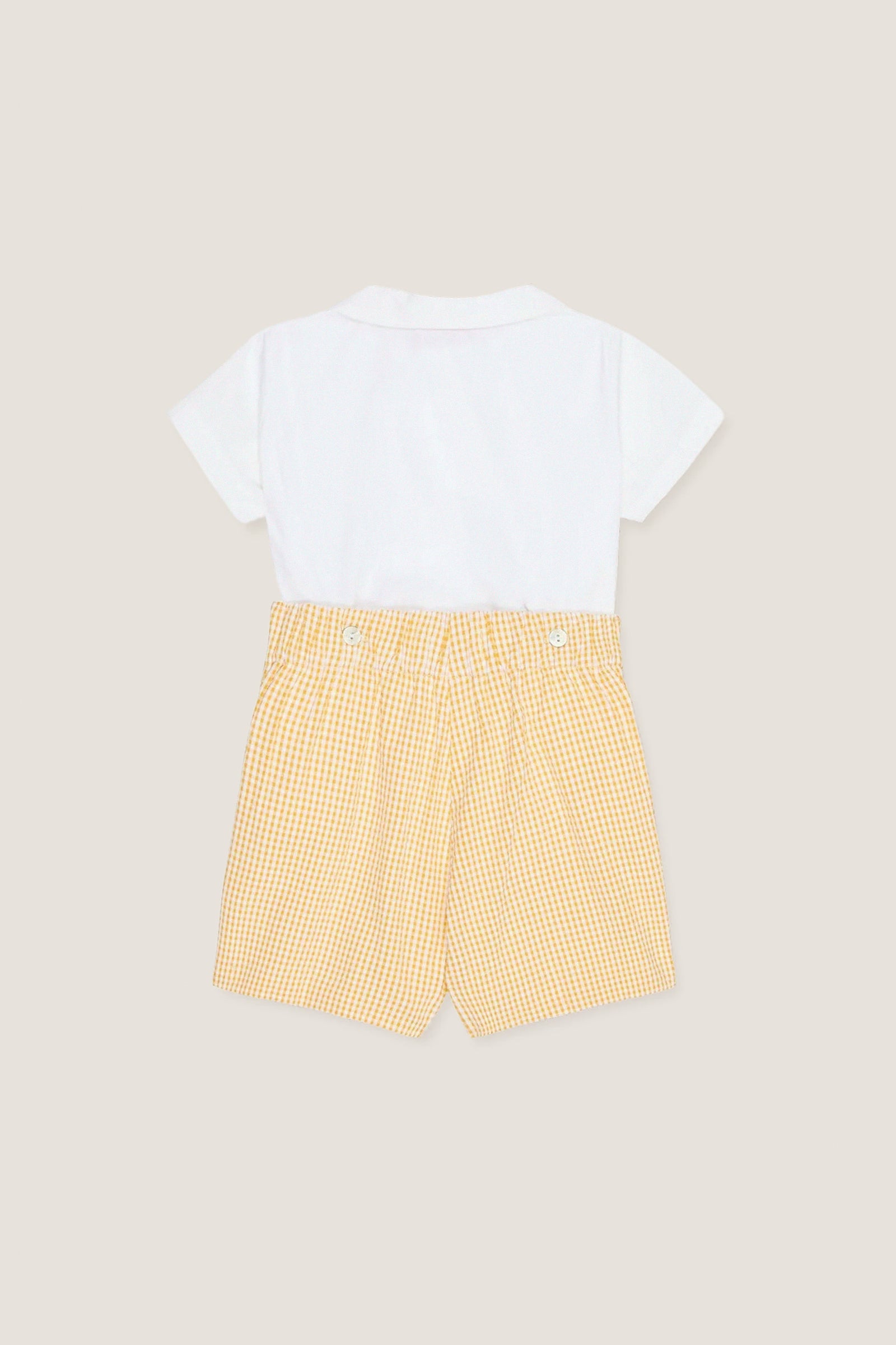 Yellow Gingham Oliver Baby Boy Set features a classic white shirt with a Peter Pan collar and effortless gingham shorts, offering high-end, fun style and comfort.