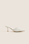 White Tia Heels: Classic mule with woven texture, pointed toe, and kitten heel. Effortless style for high-end looks, perfect for fun summer events and everyday elegance.