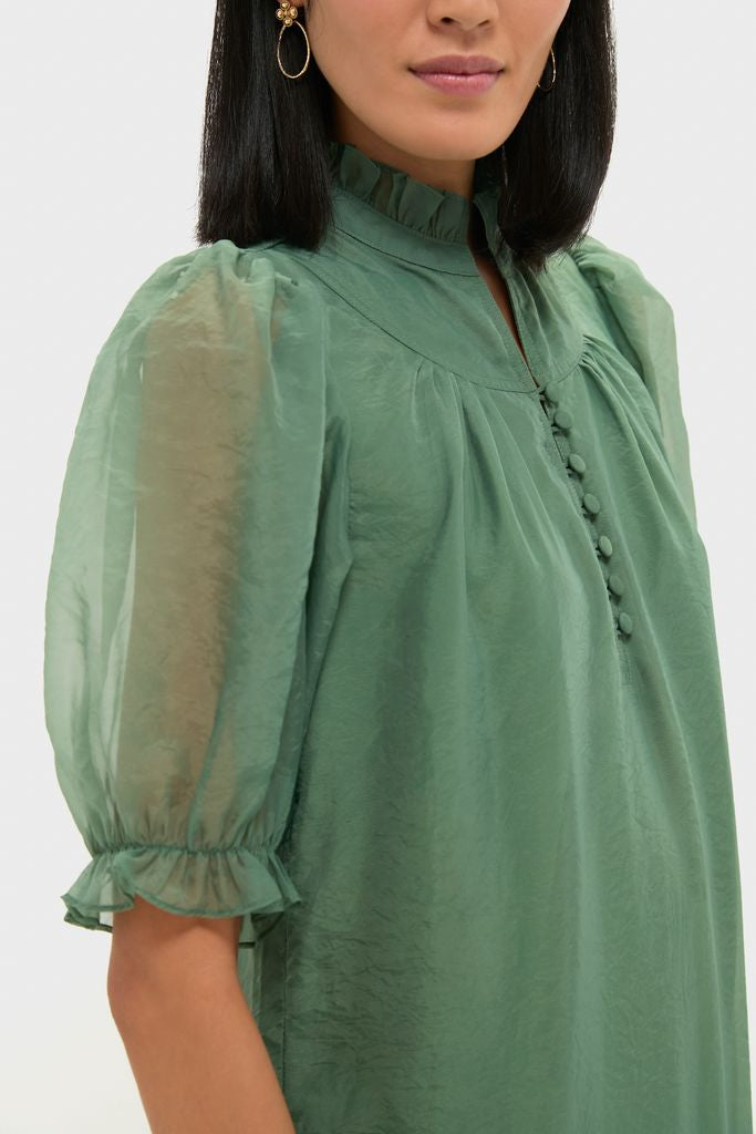 Green Chiffon Selena Maxi Dress with classic ruffle stand collar and puff sleeves, exuding effortless elegance and high-end fun with flutter cuffs and fabric buttons.