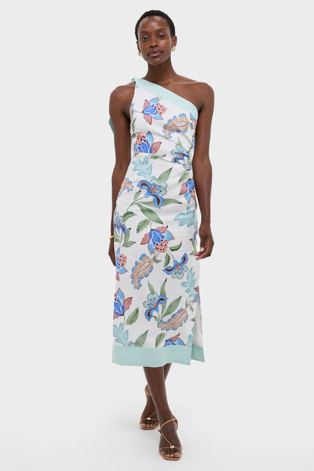 Azure One-Shoulder Midi Dress features a classic, painterly floral design with mint-green trim, embodying effortless elegance paired with strappy sandals and minimal gold jewelry. High-end fashion with a fun twist.