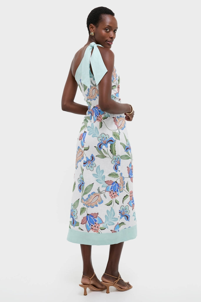 Woman in a classic Azure One-Shoulder Midi Dress featuring painterly floral prints, mint-green accents, styled with effortless gold accessories and fun, strappy sandals.