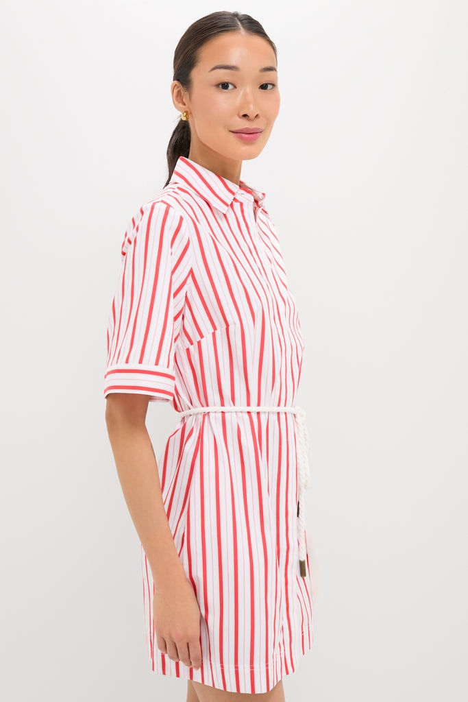 Woman wearing the Red Stripe Maddie Mini Dress with classic red and white pinstripes, structured collar, and effortless rope belt, exuding a high-end, fun style.