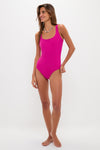 Woman modeling Berry Dreamsculpt Square Neck Tank One Piece, showcasing a classic and effortless fuchsia swimsuit with a flattering fit, perfect for high-end, fun beachwear.