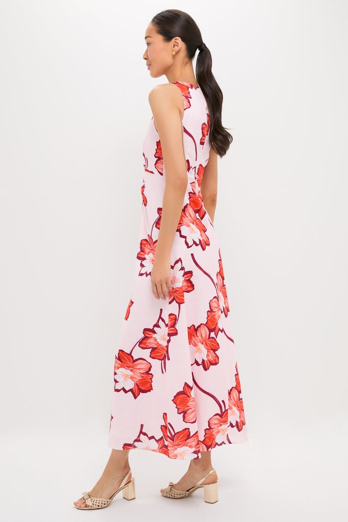 Lani Maxi Dress: A classic, effortless sleeveless dress with vibrant floral prints and a twist detail, perfect for a fun, high-end outing.