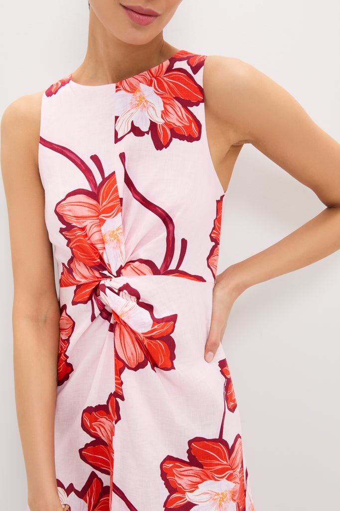 Lani Maxi Dress: Classic sleeveless A-line with vibrant floral print, high neckline, and twist detail at waist. Effortless, fun, and high-end style for any occasion.