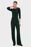 Model in Forest Pointelle Slim Fit Long Sleeve Tee with scalloped edges, paired with matching lounge pants. Effortless, classic style for high-end, fun versatility.