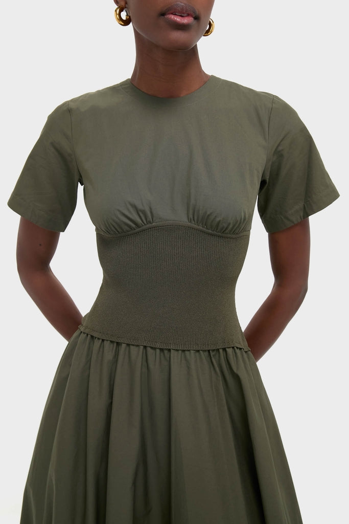 Fern Wrenna Short Sleeve Midi Dress with gathered bustline and rib-knit waist, creating a classic, effortless silhouette. Paired with simple gold hoops for a fun, high-end look.