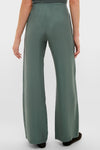 Eucalyptus Kim Pocket Pants in muted green, high-waisted and wide-leg with an elastic waistband, offering a classic and effortless style for a fun, high-end look.