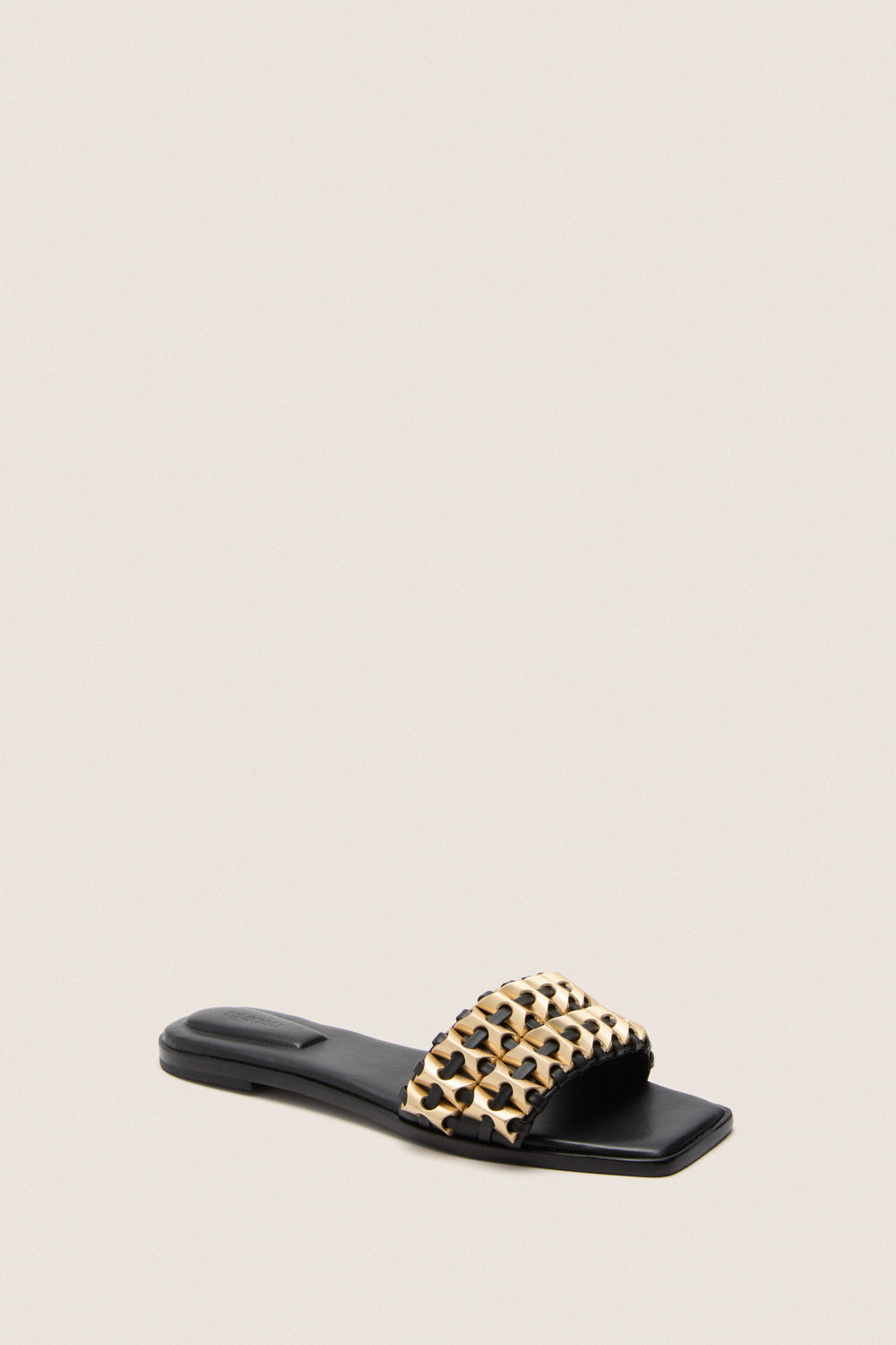 Black Faye Beaded Leather Flat Slides featuring a classic slip-on design with gold-tone woven strap, embodying effortless elegance and high-end style for a fun, versatile look.