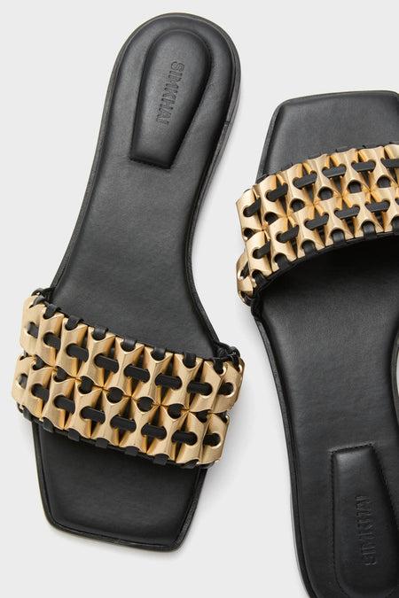 Black Faye Beaded Leather Flat Slides featuring a wide strap with interlocking gold-tone chain detail, offering a classic and effortless high-end appeal.