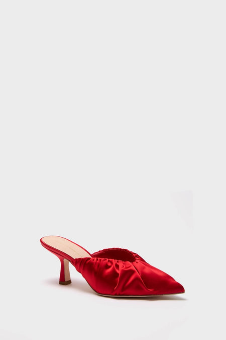 Red Satin Inez Heels: Classic slip-on mule with a pointed toe, gently ruched upper, and flared kitten heel. Effortless, fun, and high-end style for confident wear.