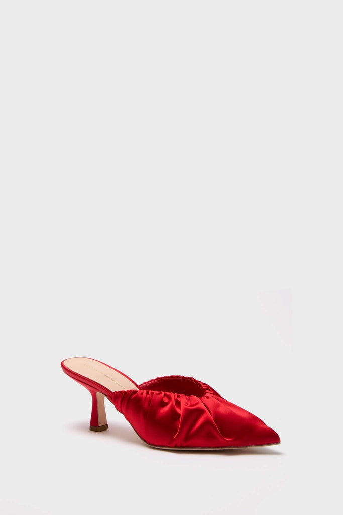 Red Satin Inez Heels: Classic slip-on mule with a pointed toe, gently ruched upper, and flared kitten heel. Effortless, fun, and high-end style for confident wear.
