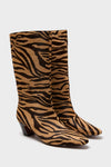 Zebra Cleo Boots: Classic mid-calf boots with an effortless zebra-stripe design, slightly pointed toe, and low block heel. A fun, high-end addition to any wardrobe.