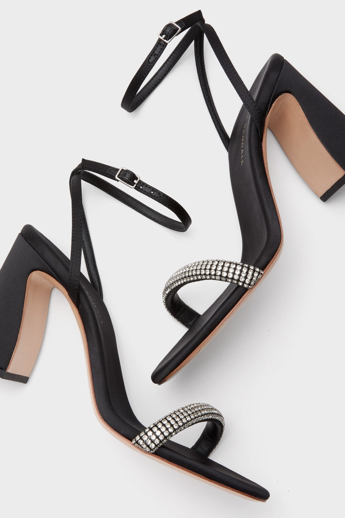 Black Satin with Diamonds Malia Heels: classic black high-heeled sandals with sparkling rhinestone toe strap, block heel, and adjustable ankle strap for an effortless, fun, and high-end look.