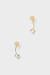 Gold Maryanne Earrings: Classic drop earrings featuring textured gold-tone flower studs and teardrop-shaped faux pearls, offering an effortless, high-end style for fun, confident wear.