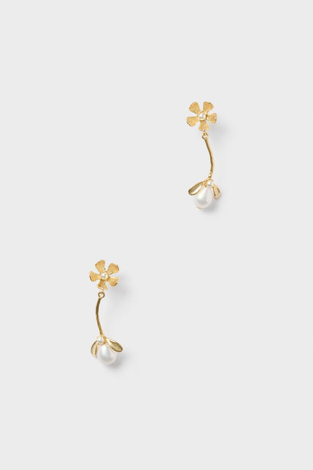 Gold Maryanne Earrings: Classic drop earrings featuring textured gold-tone flower studs and teardrop-shaped faux pearls, offering an effortless, high-end style for fun, confident wear.