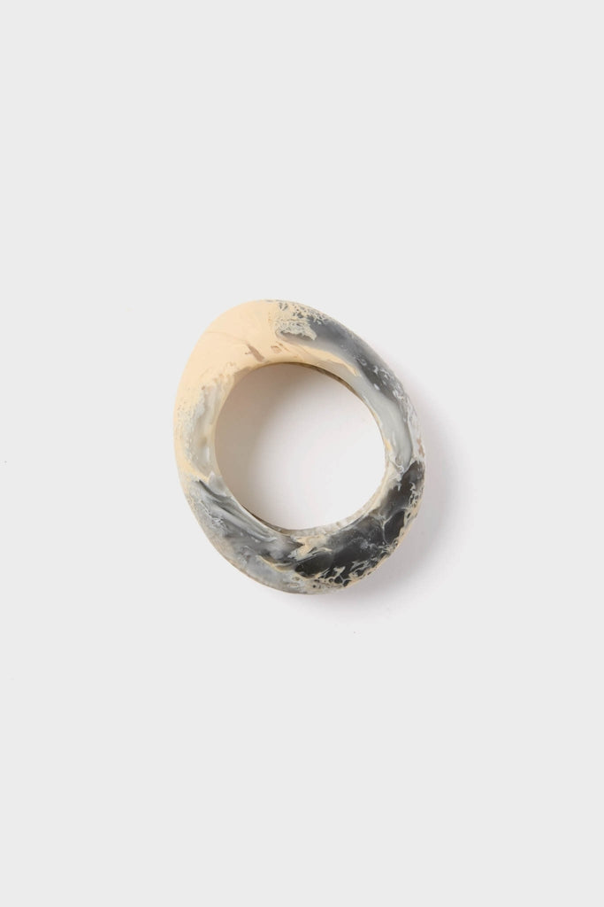 Sandy Pearl Rock Medium Bangle: A classic yet effortless chunky bracelet with a marbled swirling pattern, embodying fun and high-end style, perfect for any occasion.
