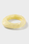 Lemon Rock Small Bangle: A classic, chunky bracelet in marbled pale yellow resin, offering an effortless, high-end look, perfect for fun, versatile styling.