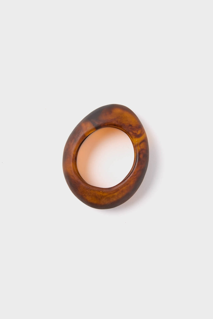 Tortoise Rock Medium Bangle: A classic, high-end translucent brown resin bangle with an effortless tortoiseshell design, embodying fun style and sophistication from Tuckernuck.