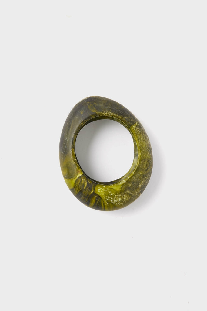 Malachite Rock Large Bangle features a chunky, marbled olive-green resin with a smooth, irregular shape, offering a classic and effortless high-end accessory for fun, versatile styling.