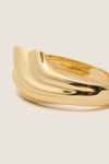 High Polish Gold Lydia Cuff: A classic, sculptural gold-tone piece with overlapping bands, effortlessly blending fun and high-end style for an elevated, versatile look.
