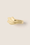 High polish gold Lydia Cuff, a fluid, abstract form exuding classic elegance and effortless style, perfect for fun and high-end fashion statements.