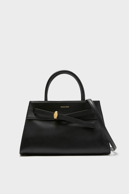 Black Veronica Beard Dash Bag in smooth leather; a classic, effortless trapezoidal tote with a top handle, detachable strap, and gold clasp detail for high-end versatility.
