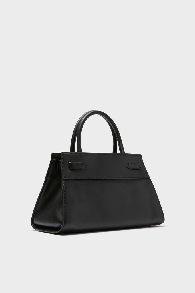 Black Veronica Beard Dash Bag with classic, structured design. Features rolled top-handles, removable shoulder strap, and interior pockets. Effortless, high-end style for versatile, fun accessorizing.