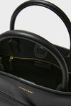 Black Veronica Beard Dash Bag, a classic, high-end leather tote with effortless style features rounded top handles, gold-stamped branding, and versatile straps for fun, everyday use.