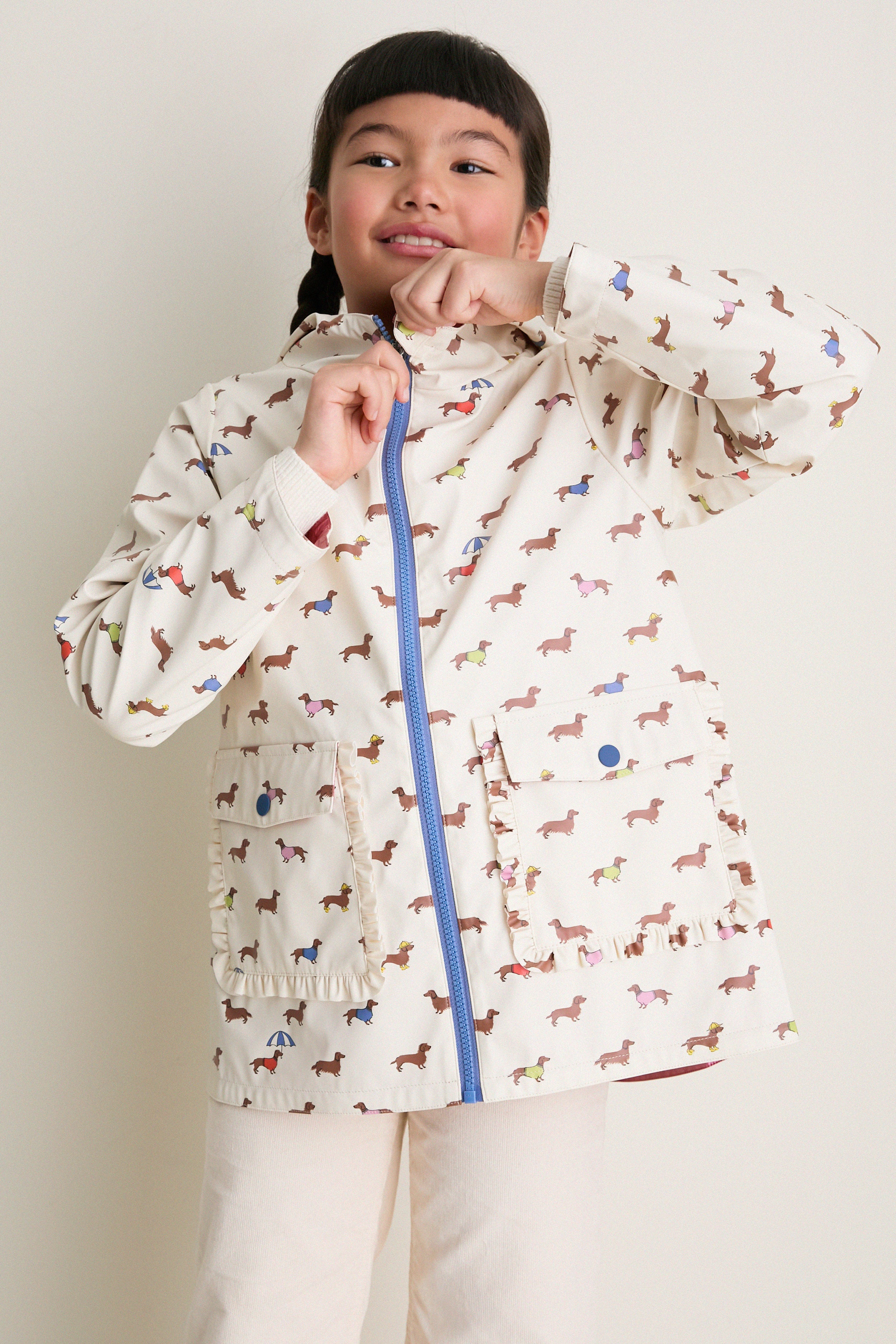 Rainy Day Dachshunds Rafa Reversible Raincoat | Pink Chicken