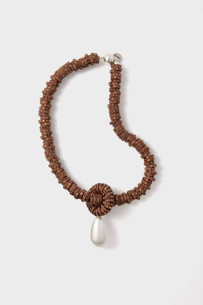 Brown Pearl Drop Necklace featuring classic, disk-shaped brown beads with an effortless teardrop pearl pendant, exuding a fun yet high-end style.