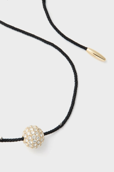 Gold and Black Spark Necklace: A classic, adjustable black cord with a pavé gold sphere, effortlessly blending high-end style with fun, versatile elegance.