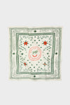 HB x Tuckernuck Stars at Night Scarf, featuring classic green stars and red starbursts, adds effortless flair and fun to any high-end wardrobe.
