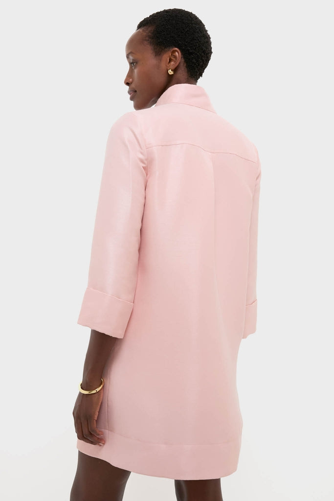 Person wearing the Soft Pink Dupioni Megan Dress, a classic, effortless A-line shift with 3/4 sleeves, stand collar, and concealed buttons, embodying a fun, high-end vibe.