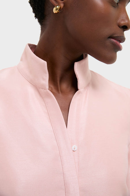 Classic and effortless, the Soft Pink Dupioni Megan Dress features a stand collar and gold hoop earring, embodying high-end, fun sophistication.