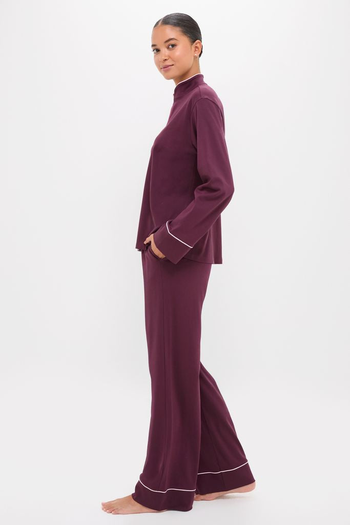 Model in classic Winetasting Wilford Women's Pajama Set. Effortless, high-end design with a relaxed fit, featuring subtle white piping, ideal for fun, comfortable lounging.