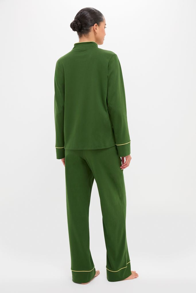 Model showcasing the classic Green Wilford Women's Pajama Set—an effortless two-piece with contrasting piping, ideal for high-end comfort and fun lounging.