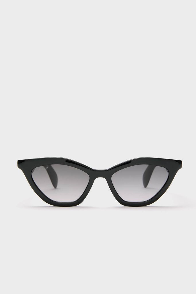 Shiny Black Cat-Eye Mods Sunglasses, classic and high-end design, offer effortless style with their sleek frame and gray-gradient lenses, embodying fun sophistication for any occasion.