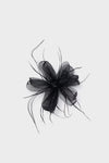 Black Embellished Feather Floral Pin with layered petals, beaded center, and feathery tendrils; a classic, high-end accessory for an effortless, fun statement look.