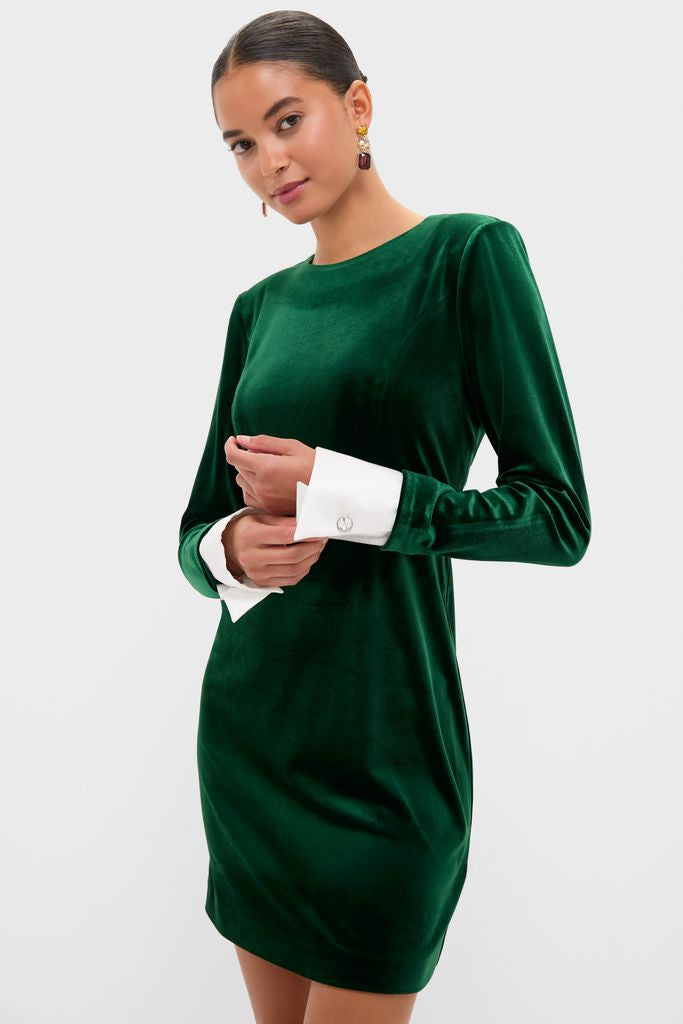 Model wearing the classic Hunter Green Velvet Etta Mini Dress with removable white cuffs, exuding an effortless, high-end style perfect for fun, festive gatherings.