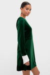 Hunter Green Velvet Etta Mini Dress: A classic, high-end A-line style in emerald velvet with fun, removable white cuffs. Effortlessly chic, perfect for festive occasions.