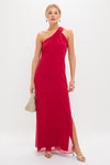 Woman models the high-end Red Soleil Gown, a classic, floor-length one-shoulder dress with a side slit, styled with elegant gold-tone accessories for an effortless and fun look.