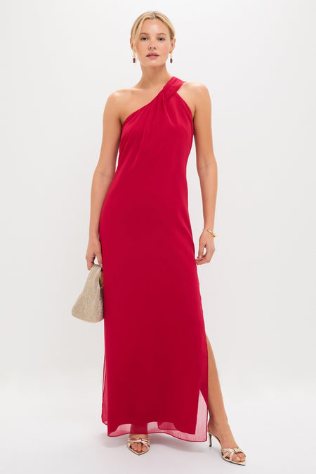 Woman models the high-end Red Soleil Gown, a classic, floor-length one-shoulder dress with a side slit, styled with elegant gold-tone accessories for an effortless and fun look.