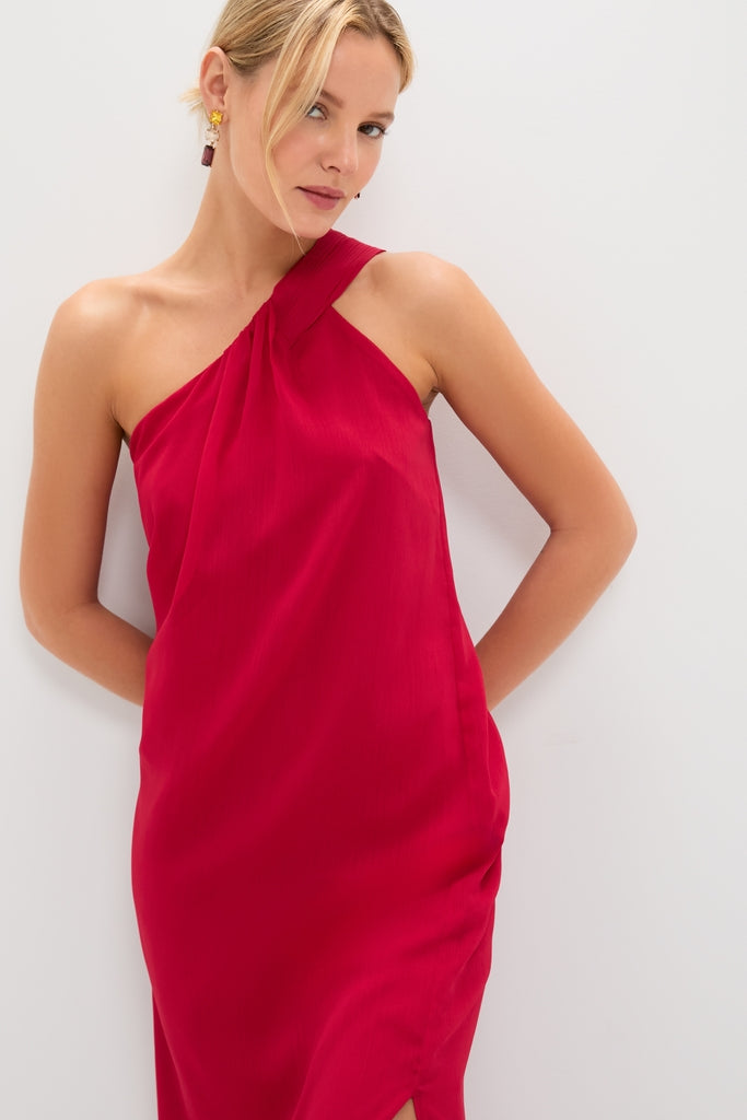 Model in a classic, high-end Red Soleil Gown, featuring an asymmetrical, sleeveless design. Effortlessly chic, perfect for fun, elegant occasions.