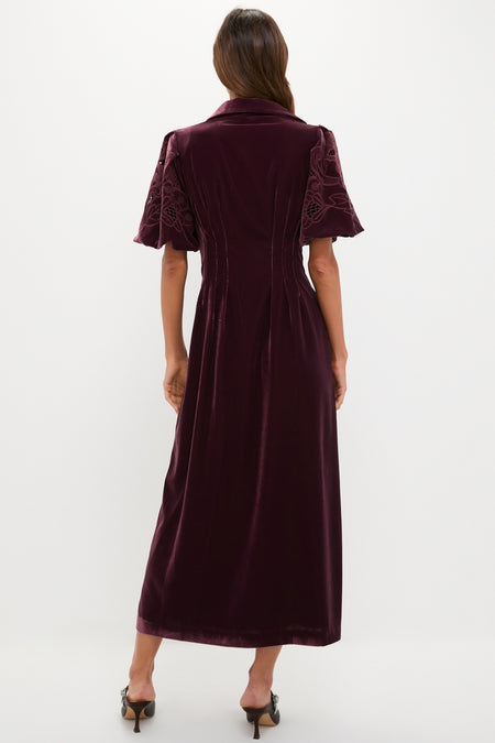 Woman in Winetasting Velvet Lace Delaney Dress with classic tailored bodice, bell sleeves, and A-line skirt, embodying effortless, high-end style for fun celebrations.