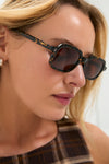 Effortlessly chic, the Flame Berlin Sunglasses feature a classic rectangular tortoiseshell frame, embodying high-end style perfect for fun, everyday wear.