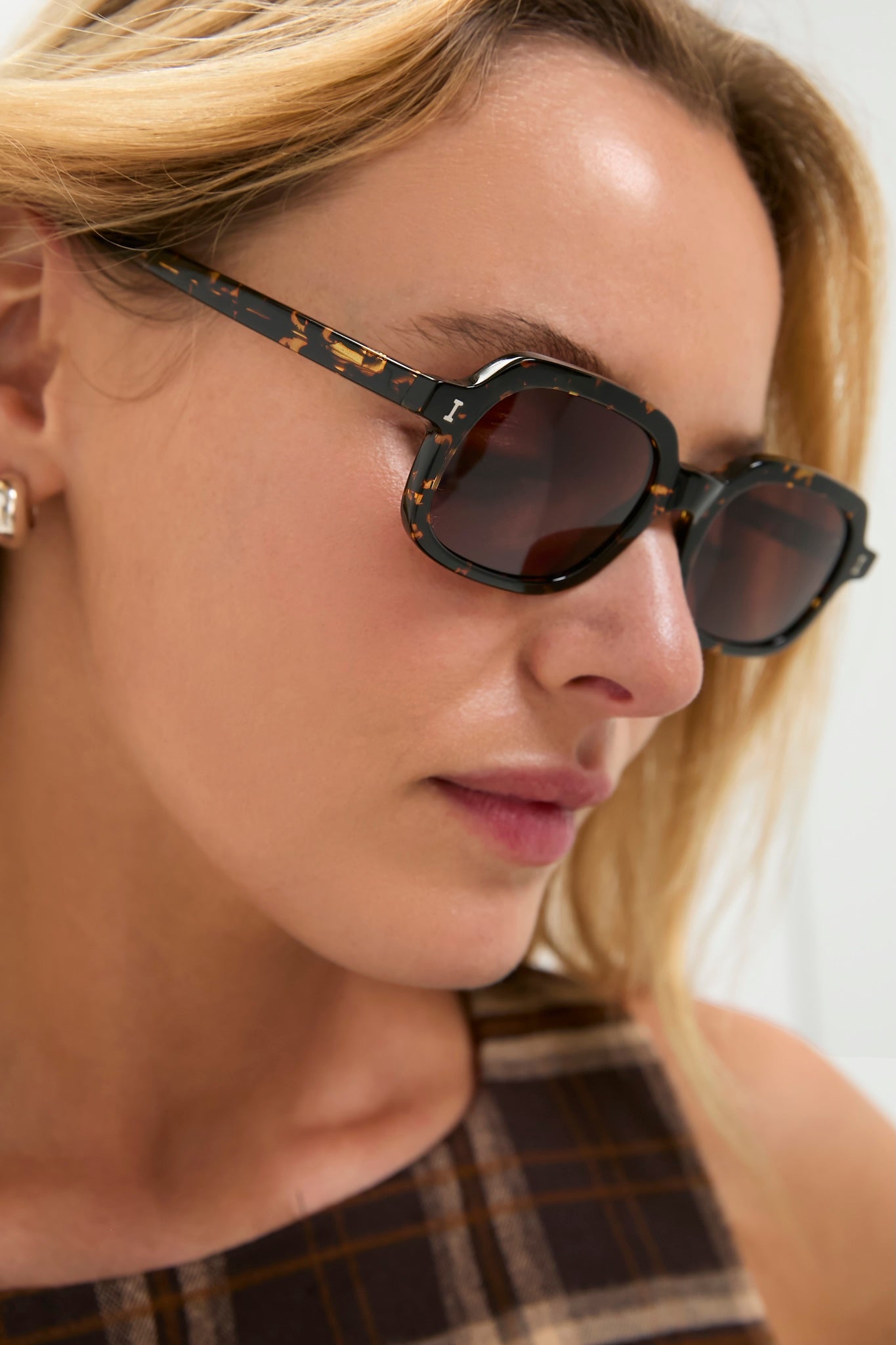 Effortlessly chic, the Flame Berlin Sunglasses feature a classic rectangular tortoiseshell frame, embodying high-end style perfect for fun, everyday wear.