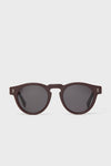 Bordeaux Leonard Sunglasses showcase classic round lenses with a high-end dark brown frame, offering an effortless and fun style for a confident, fashion-forward look.