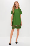 Green Tassel Downing Dress: A classic shift dress with an effortless, high-end look, featuring fun macramé fringe and sleek silhouette, perfect for festive occasions.